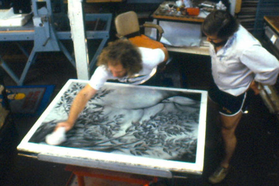 two men creating a lithographic print