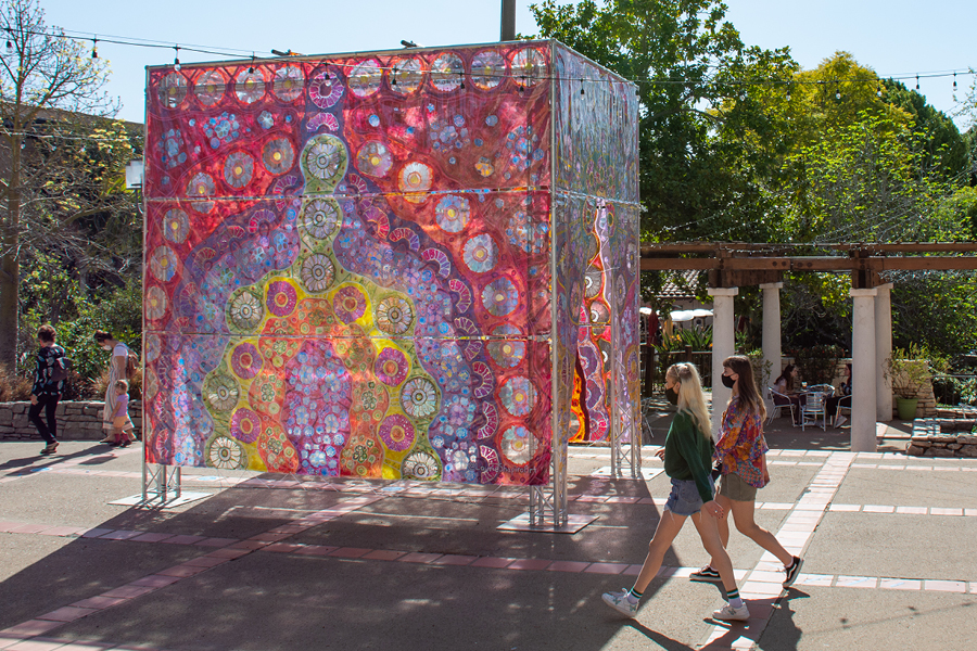A walk-through installation covered in psychedelic floral designs