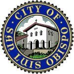 City of San Luis Obispo logo. A white painted Spanish mission at the center of a blue ring with "City of San Luis Obispo" in white letters