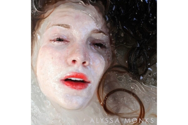 Alyssa Monks' artwork "Squid" featuring a photorealistic painting of a woman laying in water, with her face just above the surface