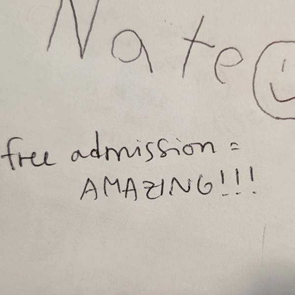 "free admission = amazing!!!" written in SLOMA's guest book