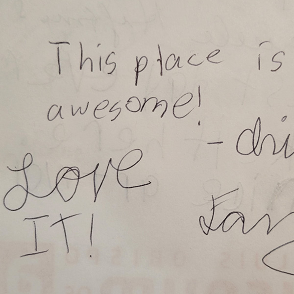 "This place is awesome!" written in SLOMA's guest book