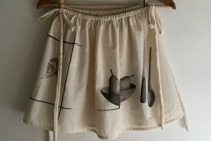 Hand-drawn images on repurposed natural fabrics