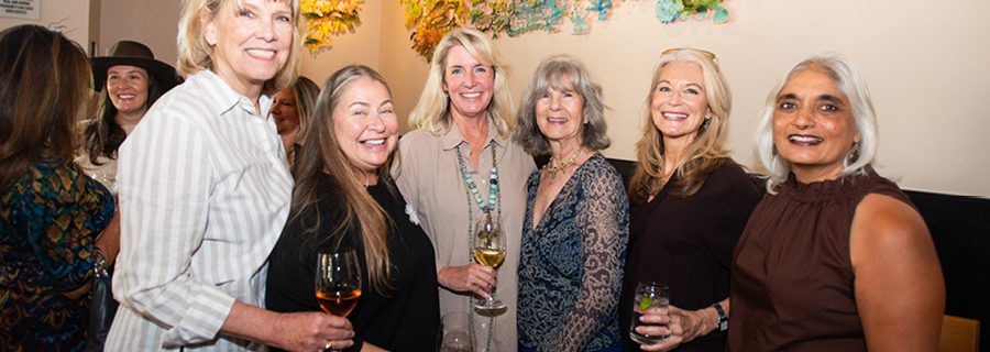 Photo of 6 women smiling for the camera